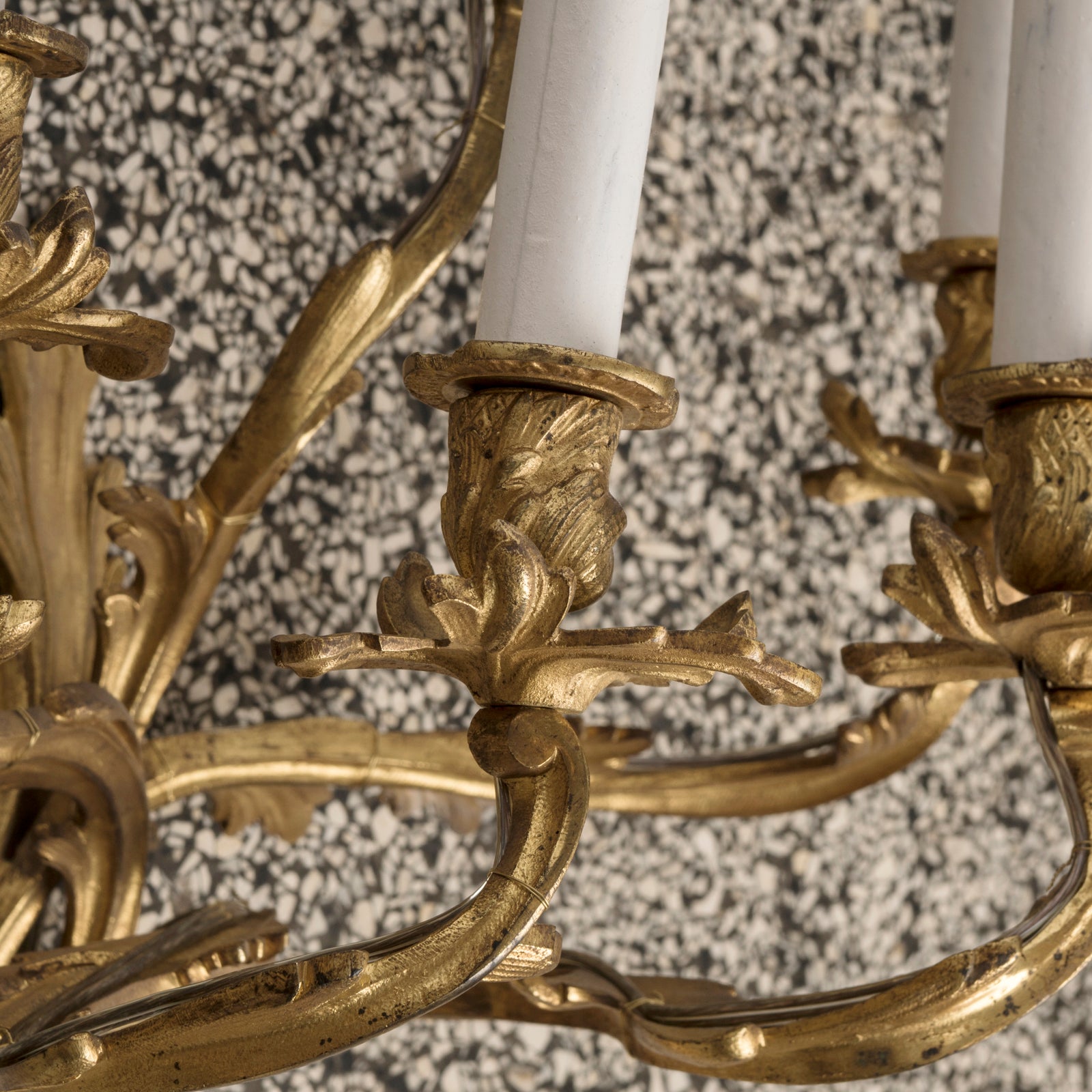 Close-up of a gand 19th-century French Rococo five-light sconce or wall light, crafted from richly gilded bronze