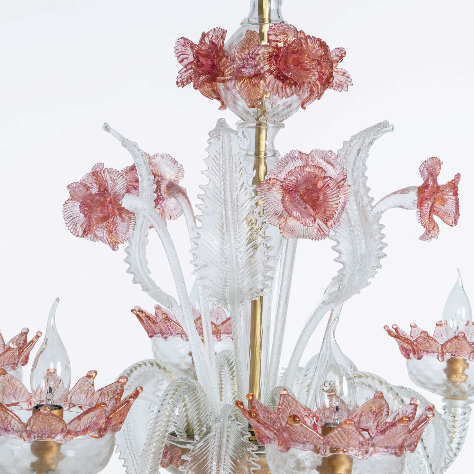 Close-up of a vintage Venetian Murano Glass 6-light chandelier with white glass and pink floral details, featuring intricate craftsmanship, available at Wildschut Antiques