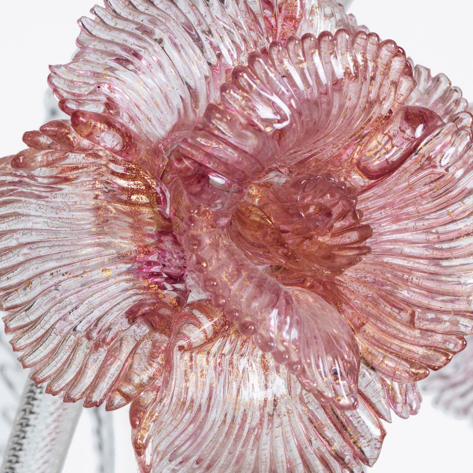 Close-up of a pink flower of a vintage Venetian Murano Glass 6-light chandelier with white glass and pink floral details, featuring intricate craftsmanship, available at Wildschut Antiques
