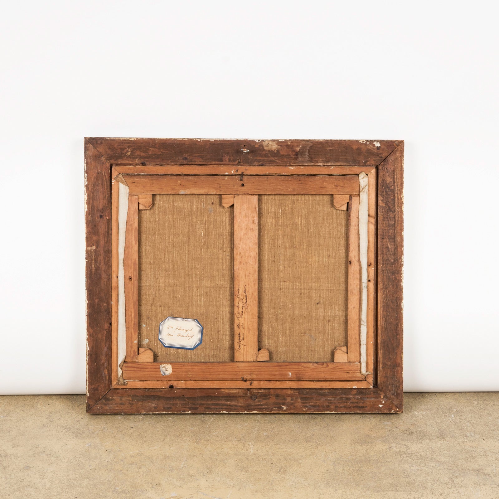 Backside of vintage oil painting, signed by F. Jorwitz and encased in a 1950s-60s style frame