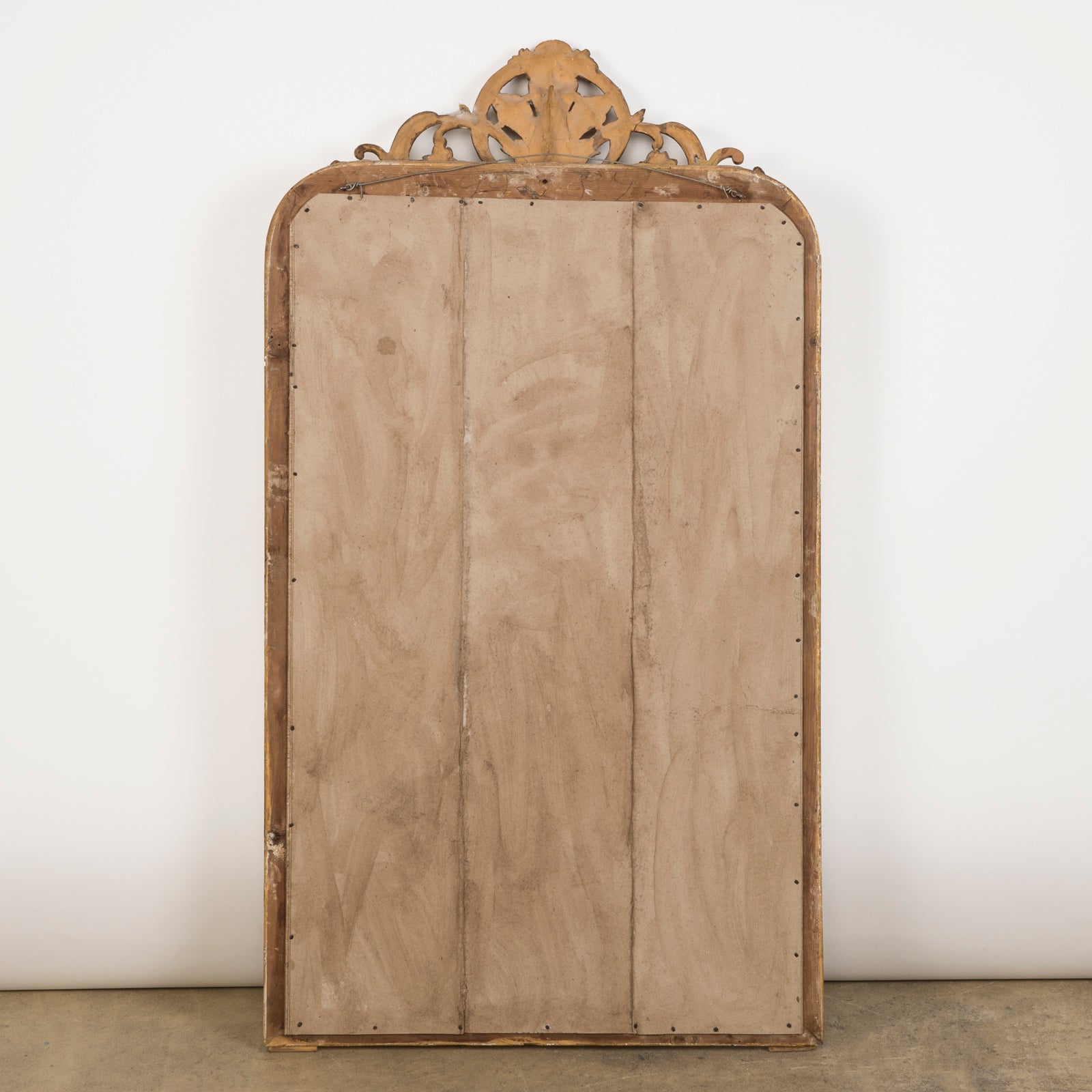 Backside of an antique 19th-century French Louis Philippe-style gilt mirror