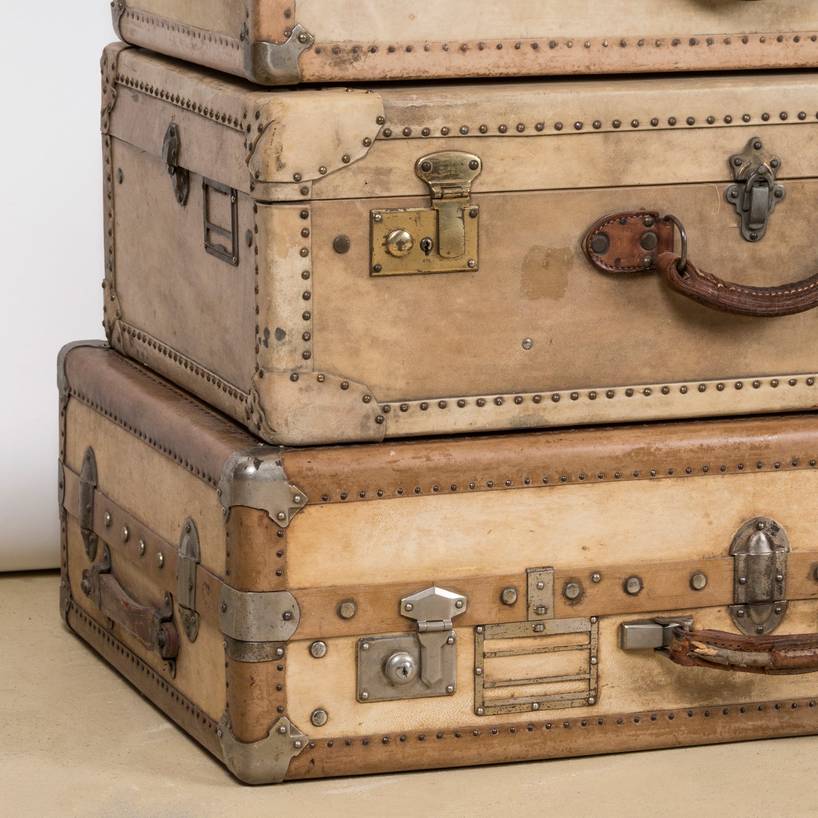 Vintage Collection of Vellum White Leather Suitcases