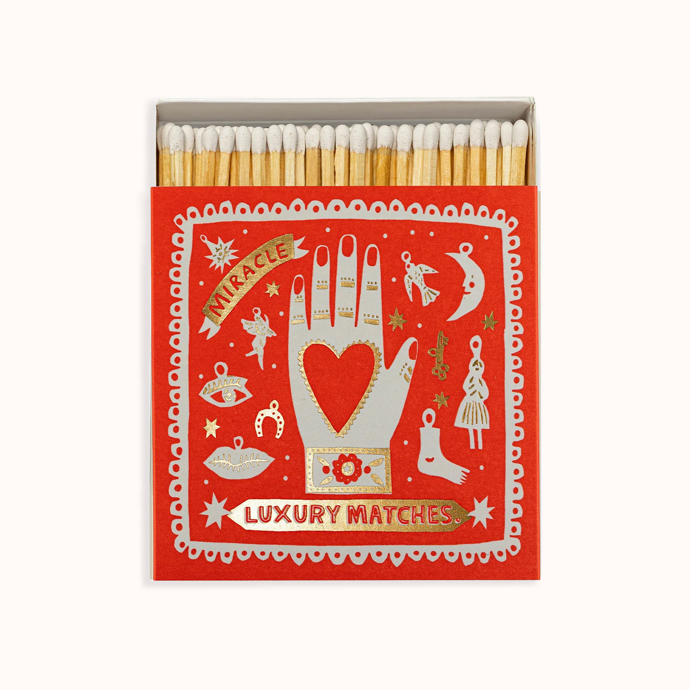 A box of Archivist Gallery luxury matches with a colorful design featuring hands, hearts, and decorative elements on a red background. Part of the Archivist Gallery Collection, available at Wildschut Antiques.