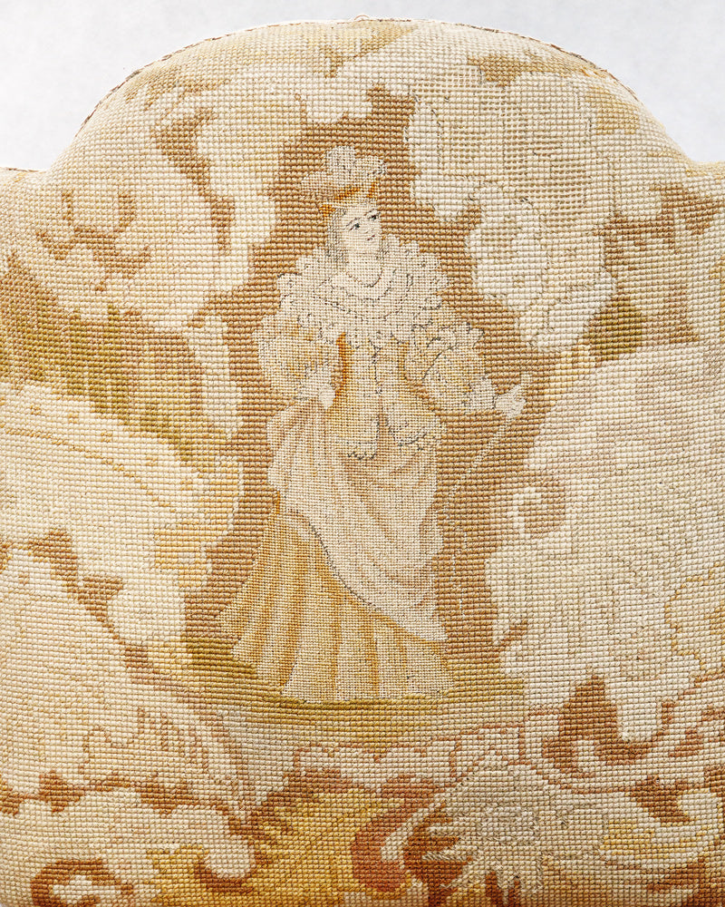 Close-up of a decorative Aubusson tapestry fabric with a woman in a historical dress design