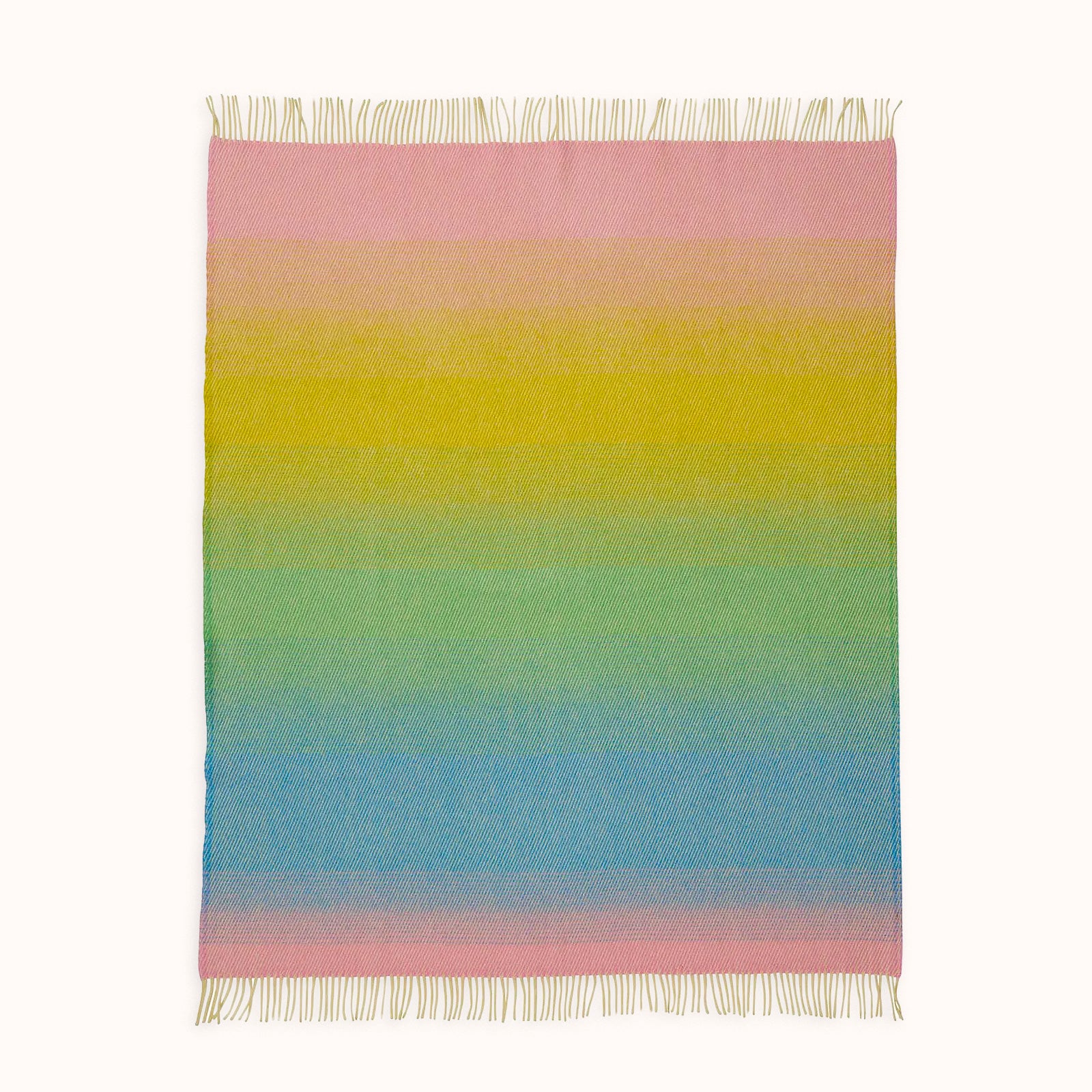 Multicolored striped wool blanket with fringes on a white background