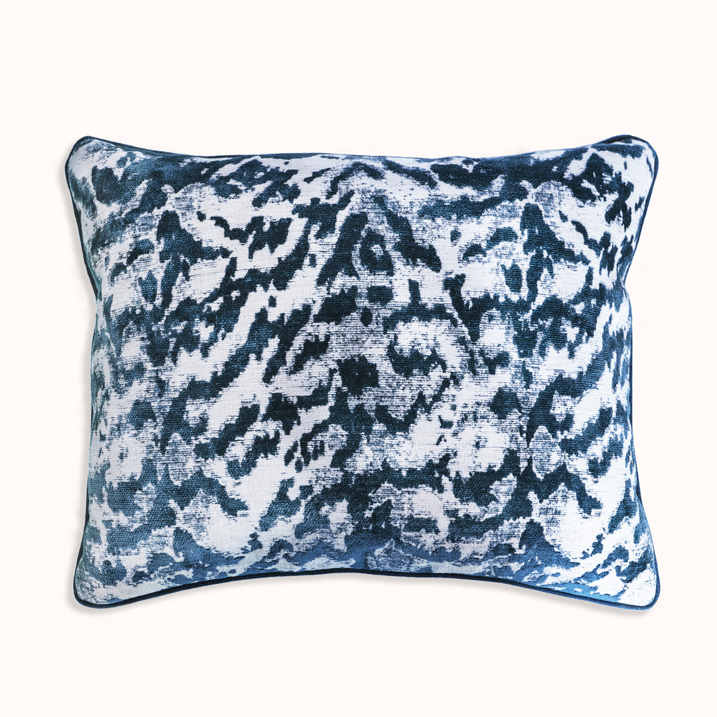 A square-shaped throw pillow with a blue tiger pattern on a silk velvet surface and a natural blue stone-washed linen back, available at Wildschut Antiques
