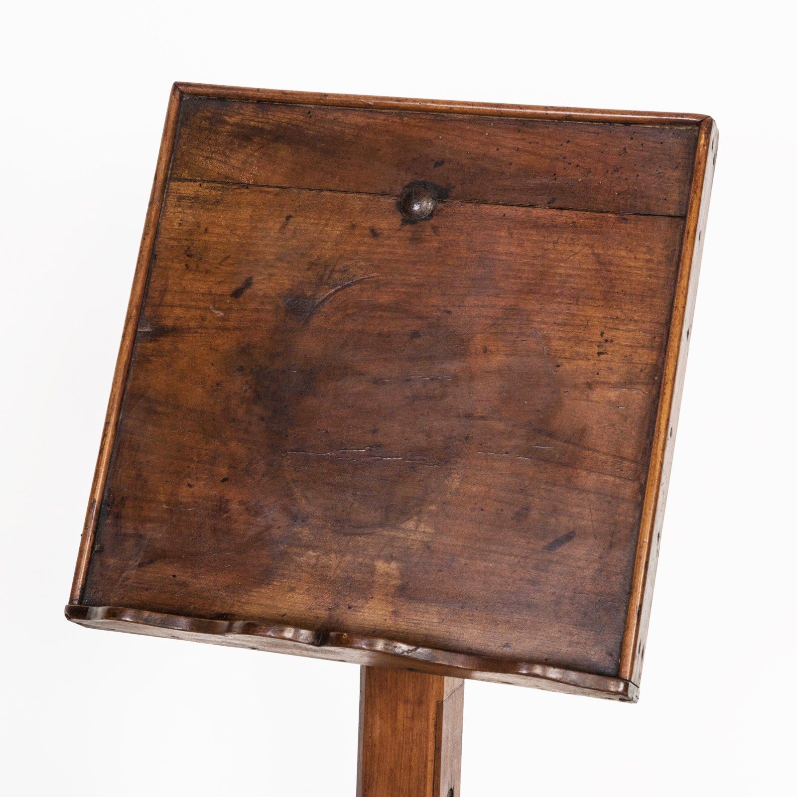 Close-up of the top part of an antique wooden reading stand or book stand with an adjustable top, available at Wildschut Antiques