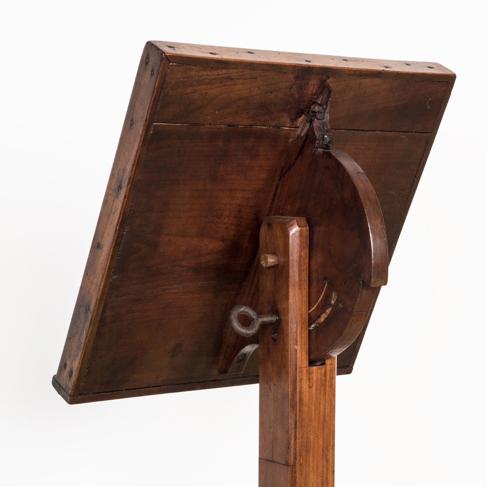 Close-up of an antique wooden reading stand or book stand with an adjustable top