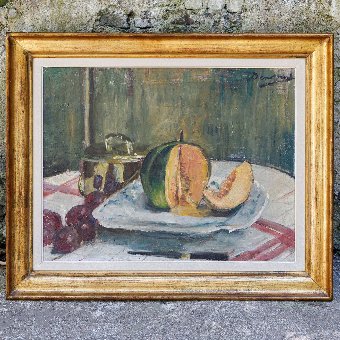 Lovely colorful early 20th-century still life painting by Alexandre 'Alex' Denonne (Belgium, 1879–1953) depicting a sliced melon on a white plate.