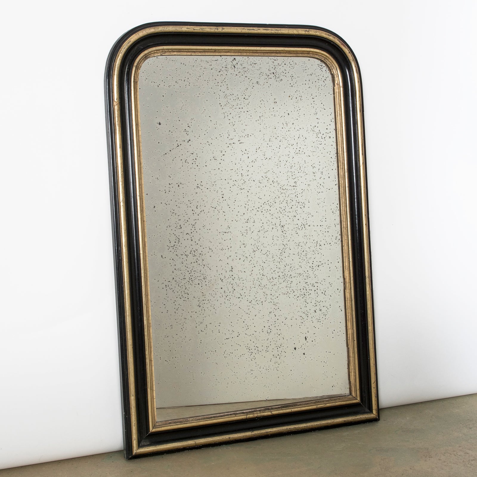 19th C Foxed Black and Gold Napoleon III Mirror