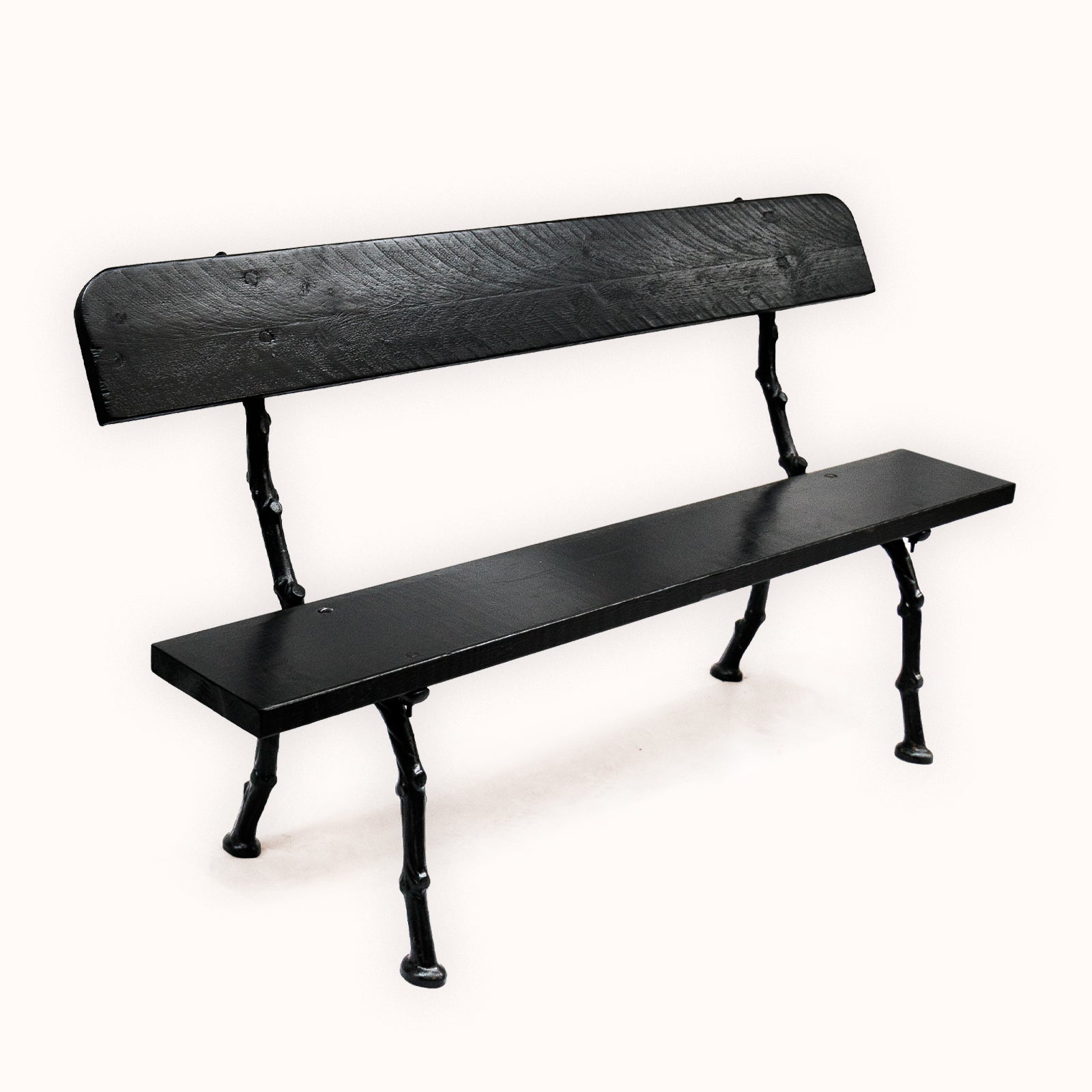 A black painted faux bois cast iron garden bench with a single-plank wooden seat and backrest, available at Wildschut Antiques