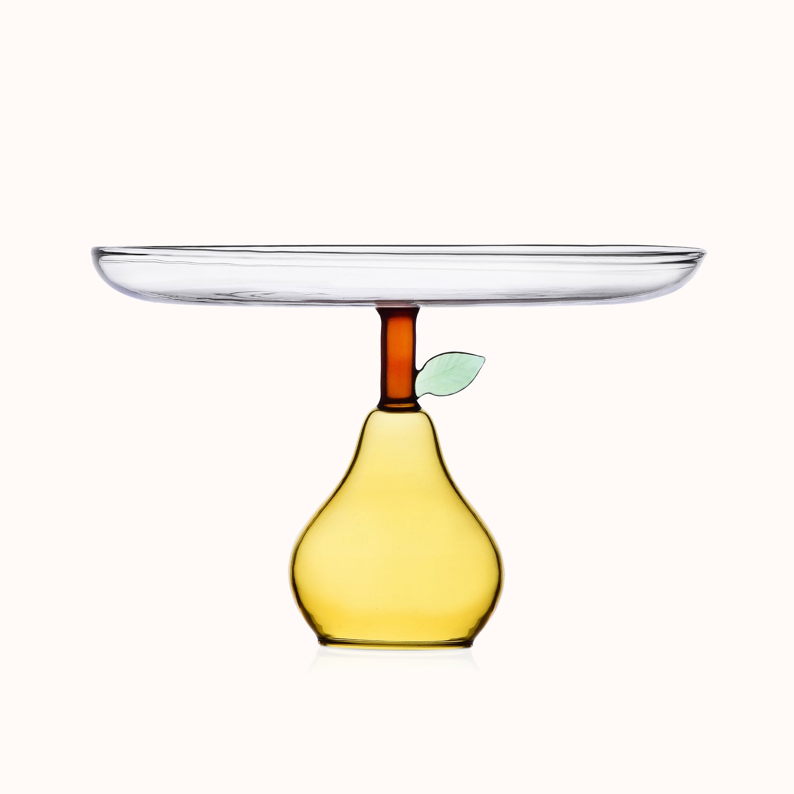 Pear-shaped cake platter from Ichendorf Milano's Fruit and Flower collection, featuring a fruit design at the base and a clear glass top, set against a clear background, available at Wildschut Antiques.