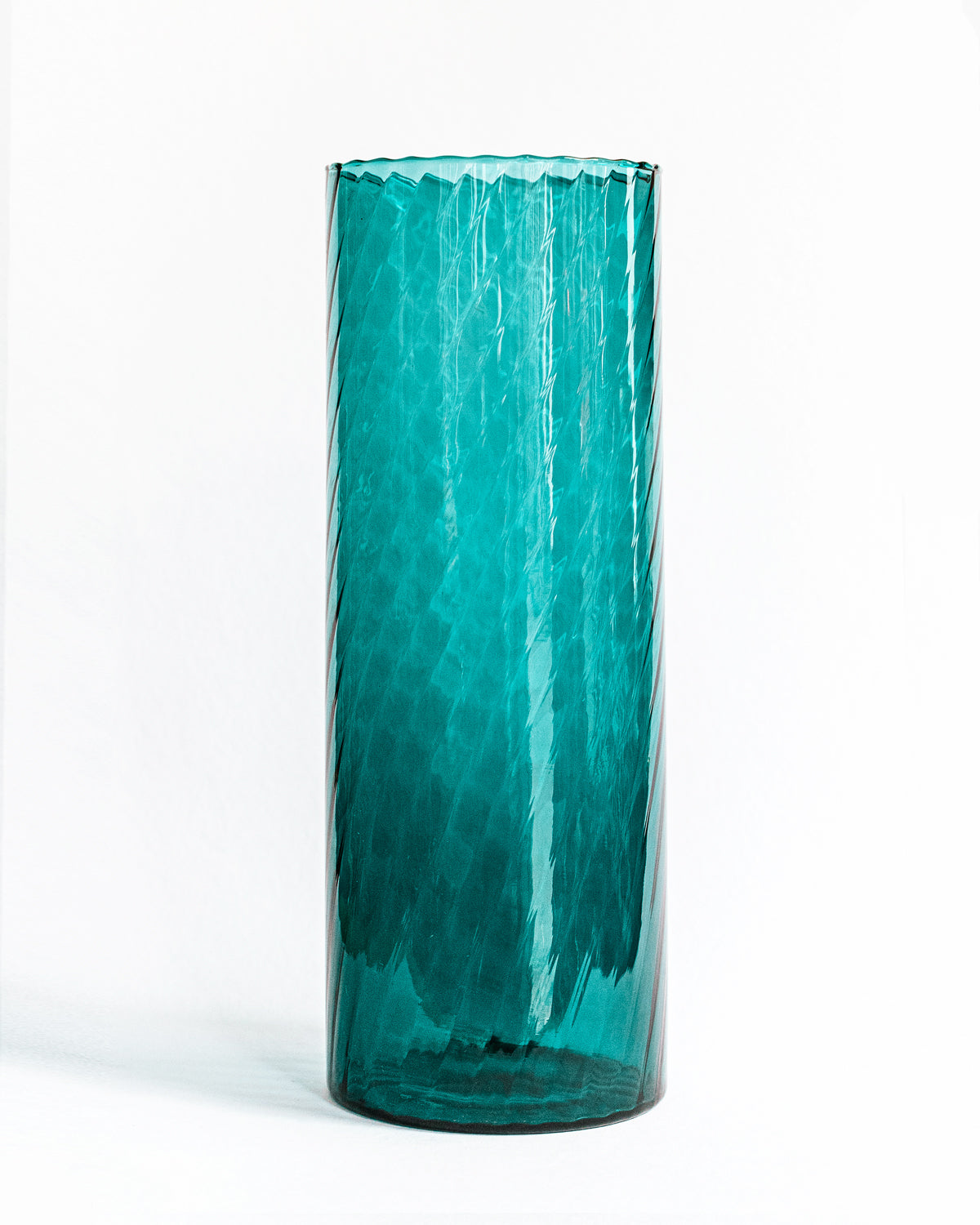 A large vintage Murano glass vase in petrol blue with a swirl pattern, available at Wildschut Antiques
