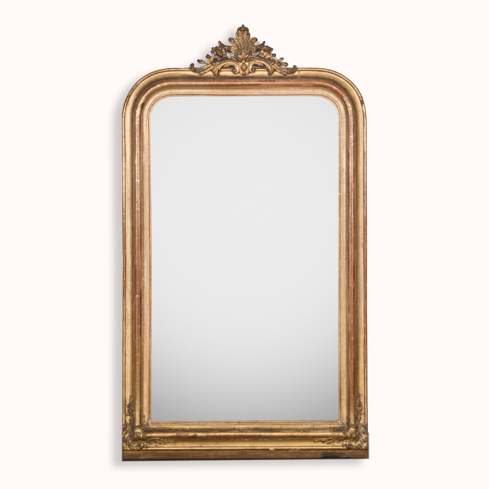 Antique French 19th Century Louis Philippe style gold gilt mirror with small crest and rounded upper corners, available at Wildschut Antiques