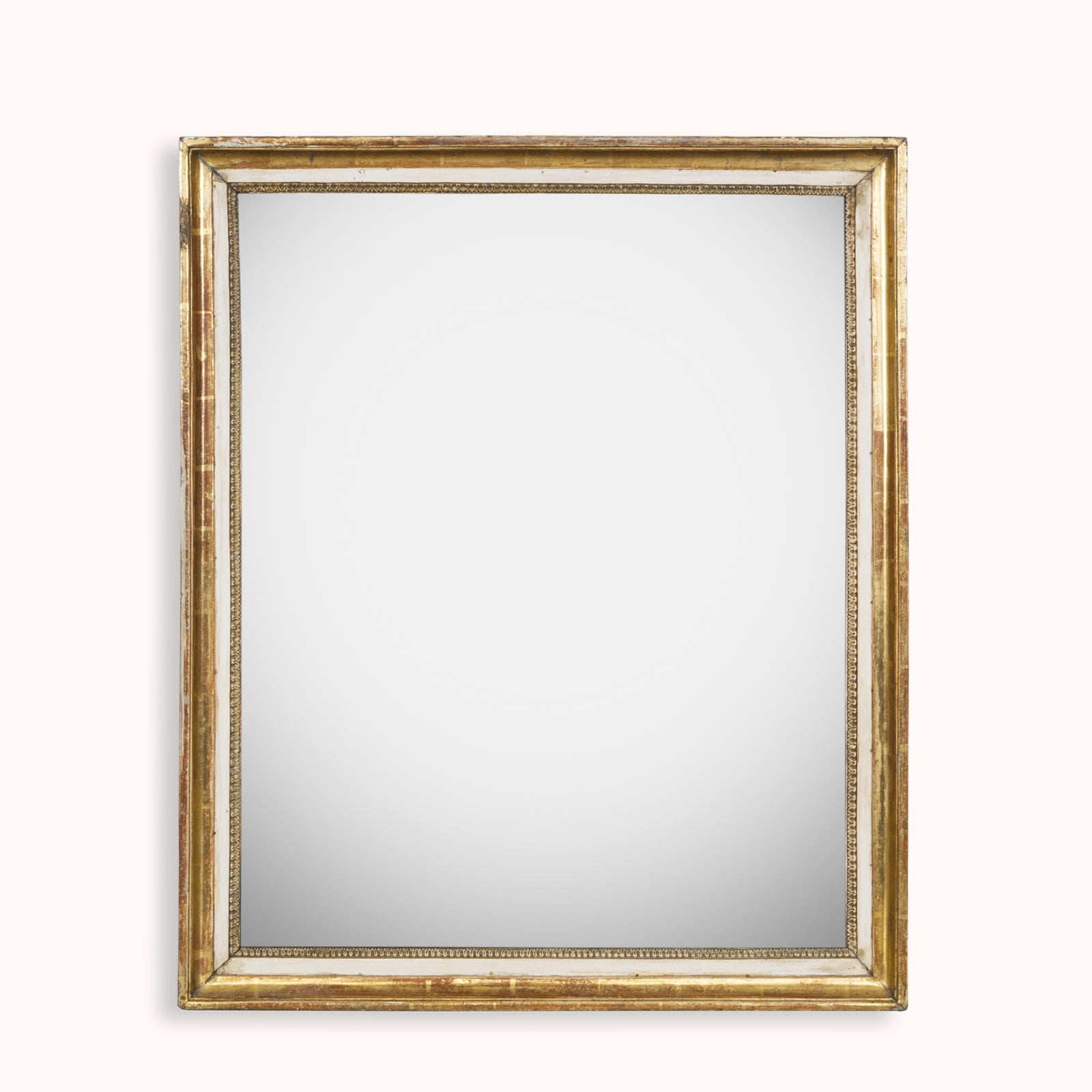 An antique French gold gilt rectangular mirror with foxed glass, available at Wildschut Antiques