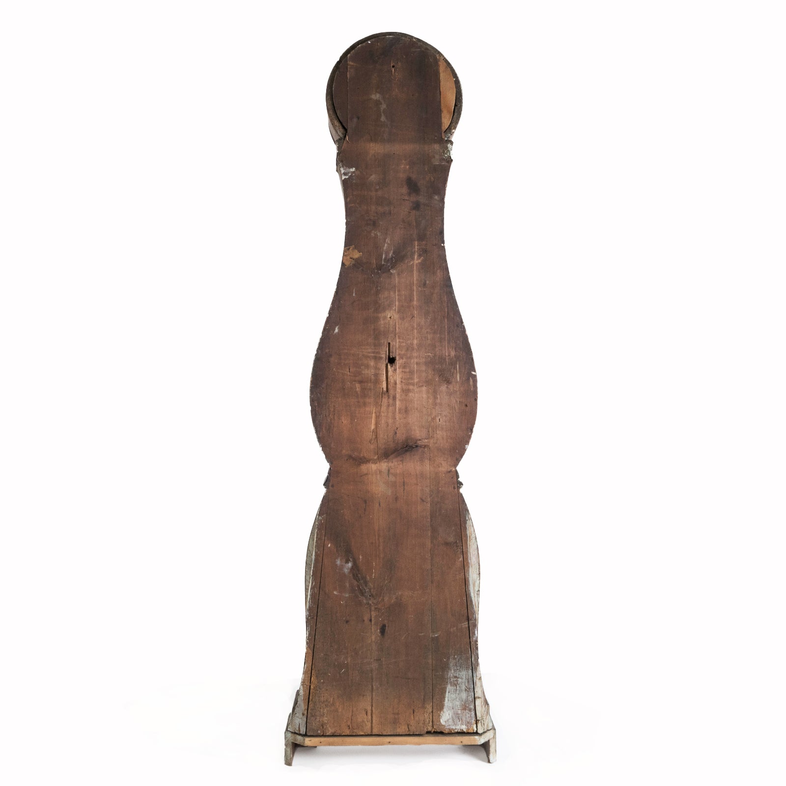 Backside of an antique Swedish Mora clock with a natural finish, wide belly body, and a numeral face