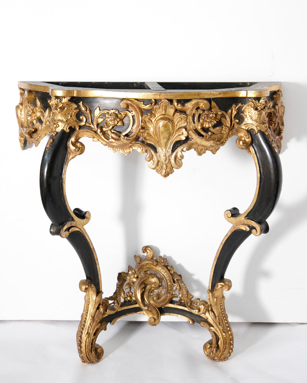 Decorative antique Napoleon III style console table with gold and black embellishments available via Wildschut Antiques