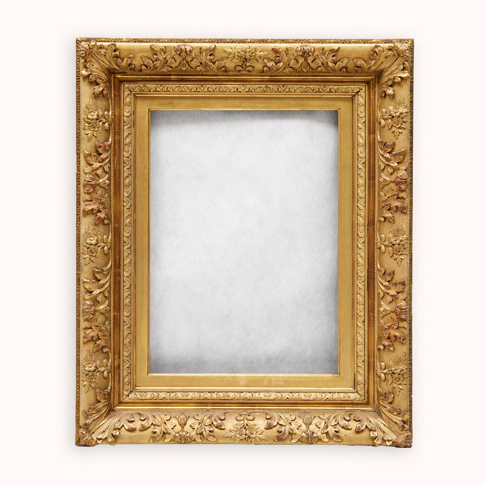 Decorative antique French baroque gold frame on a white background available at Wildschut Antiques