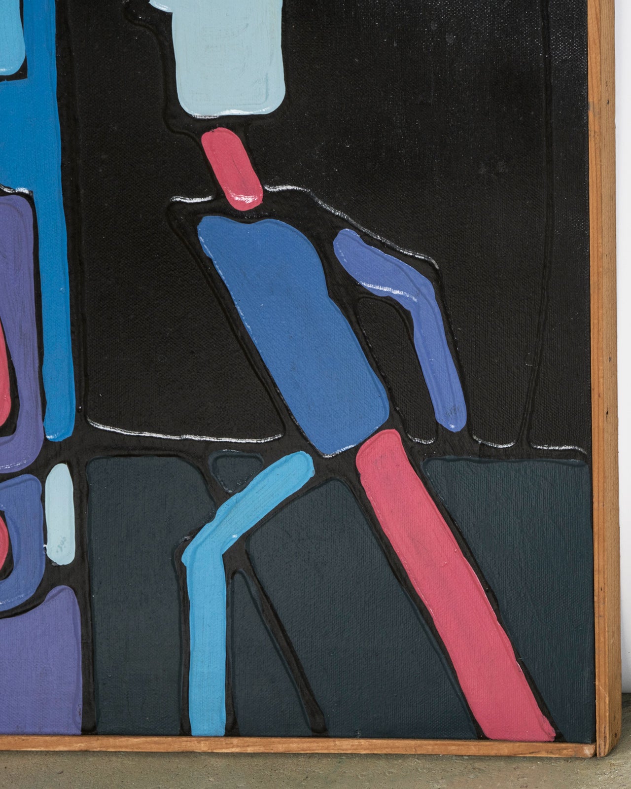 Abstract artwork with geometric shapes in blue, red, and black on a dark background