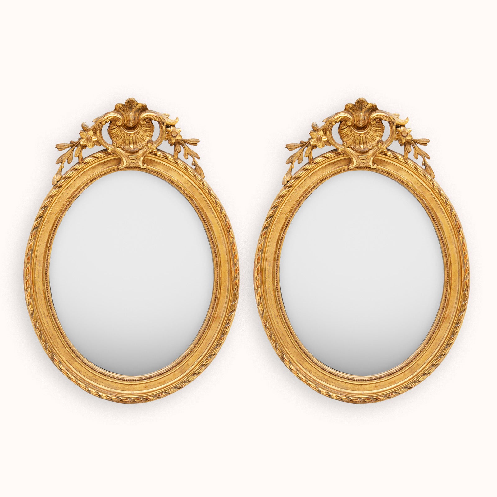 A pair of two ornate antique French gold gilt oval frames available at Wildschut Antiques