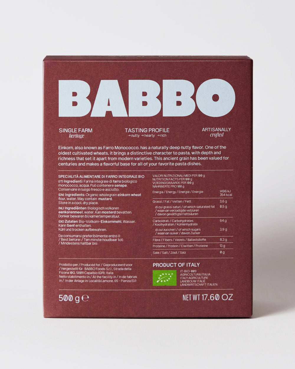 The back of a 500g box of Babbo organic flatbread dough, shown against a light gray background. The box is dark reddish-brown with white text and features the Babbo logo, product details, and a green organic certification seal.