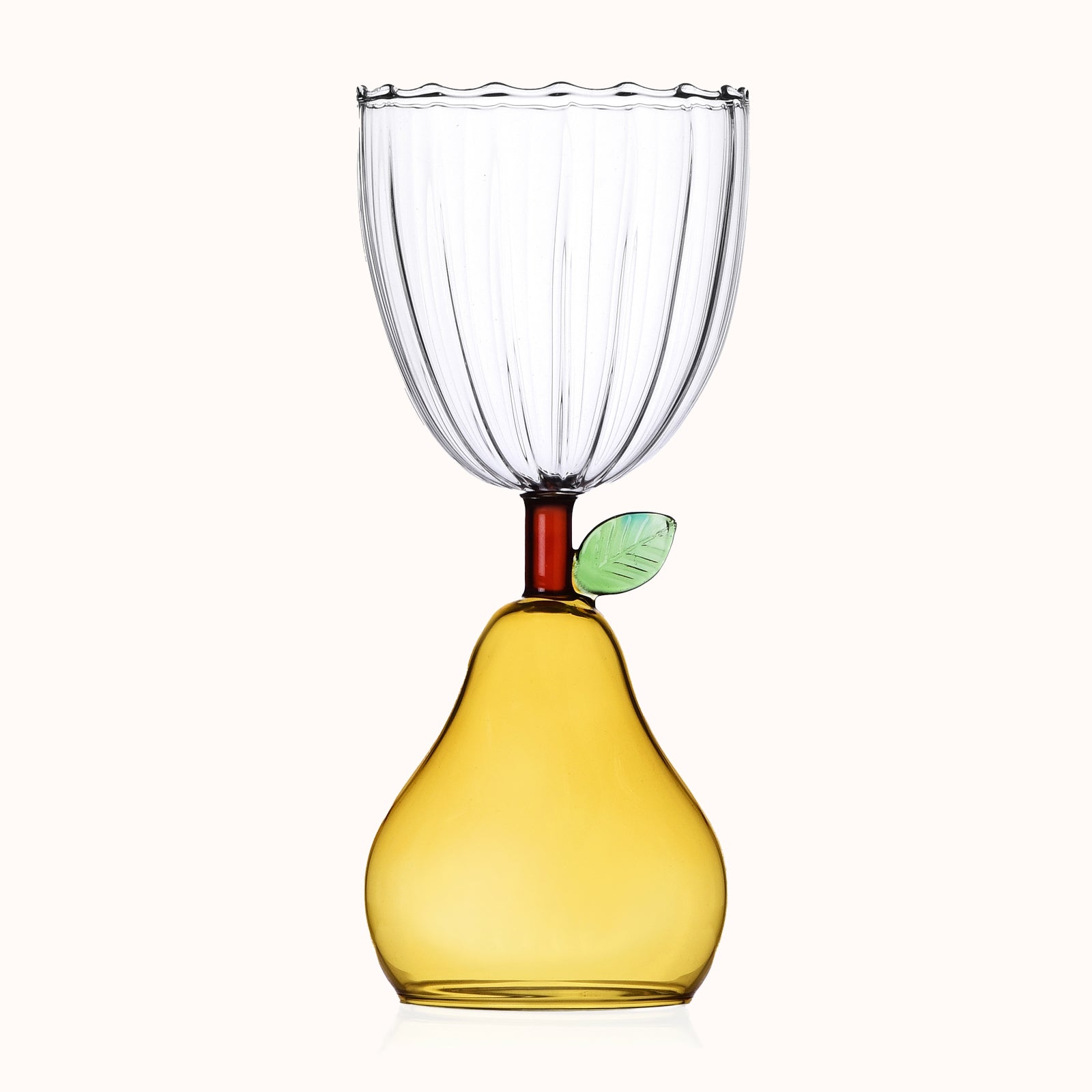 A pear-shaped yellow-colored wine glass with a fruit design at the base and a clear glass, part of Ichendorf Milano's Fruit and Flower collection, available at Wildschut Antiques