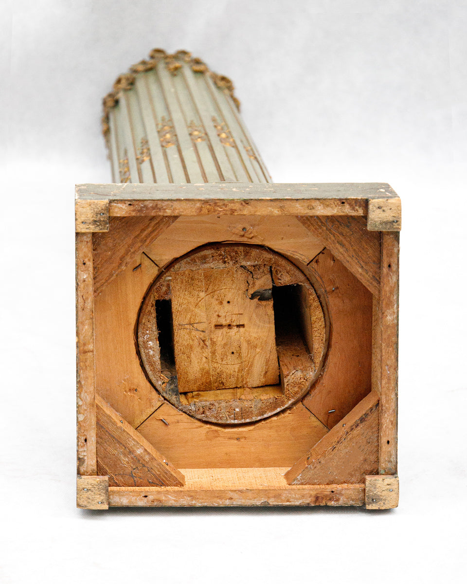 Wooden base of a cylindrical wooden object on a white background