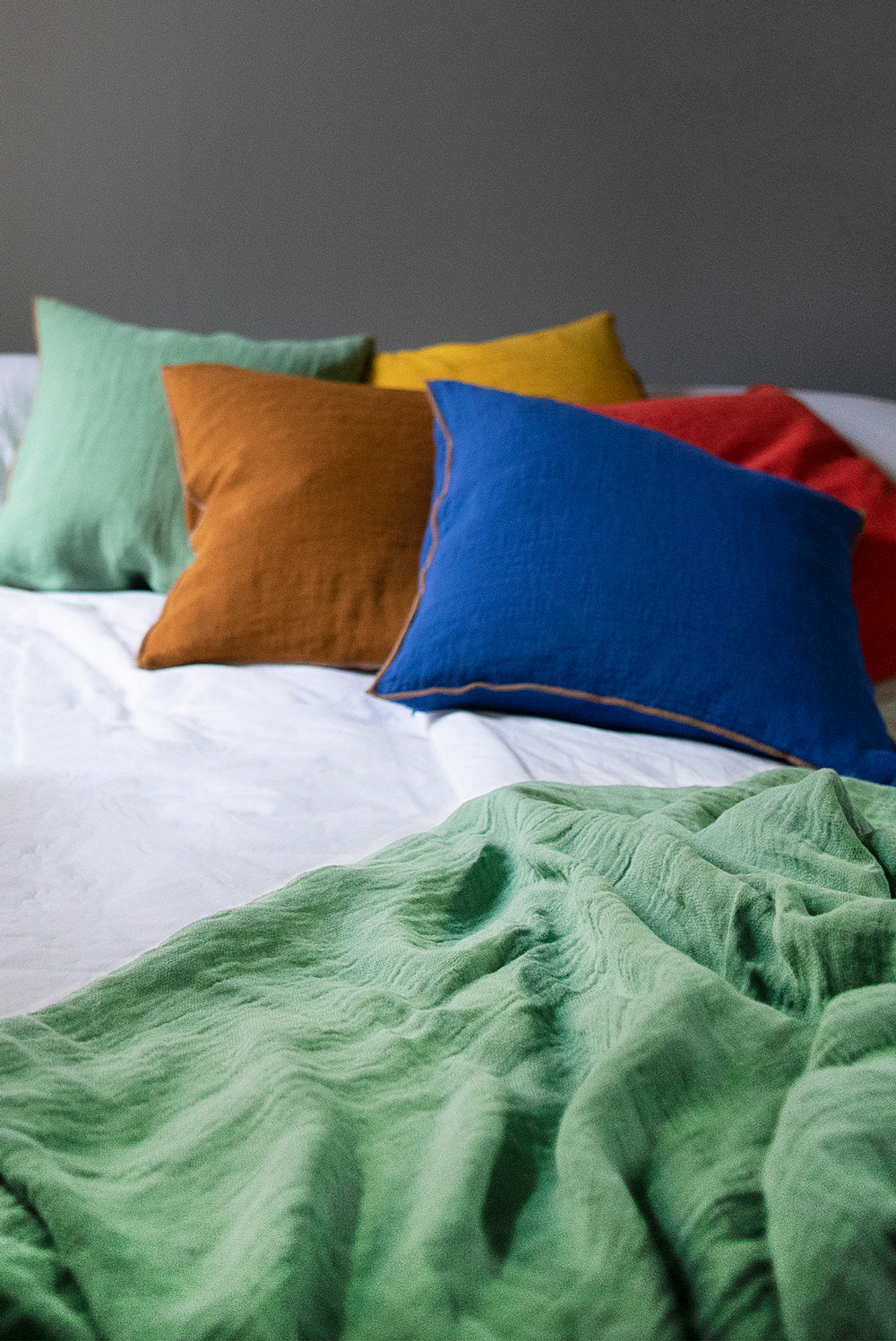 A bunch of soft linen pillows