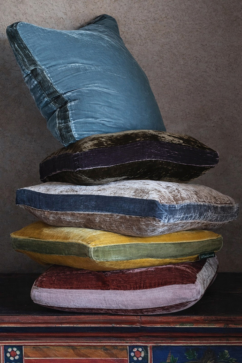 Stack of multicolored silk velvet velour square cushions, model James, designed by Monde Sauvage Paris, available at Wildschut Antiques.