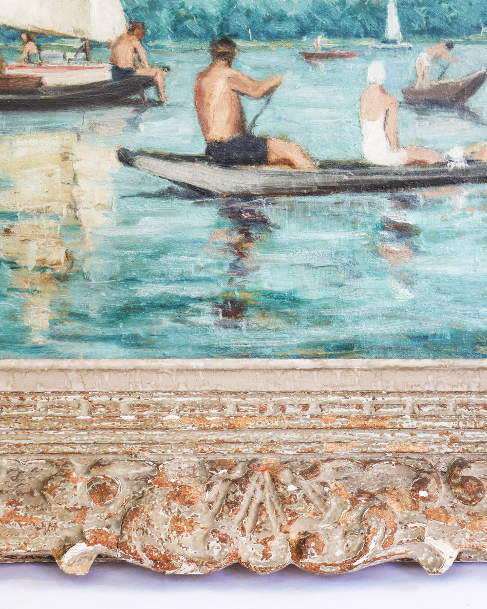 Close-up of an oil painting depicting figures in a rowboat with sailboats on a lake, set in a decorative wooden frame