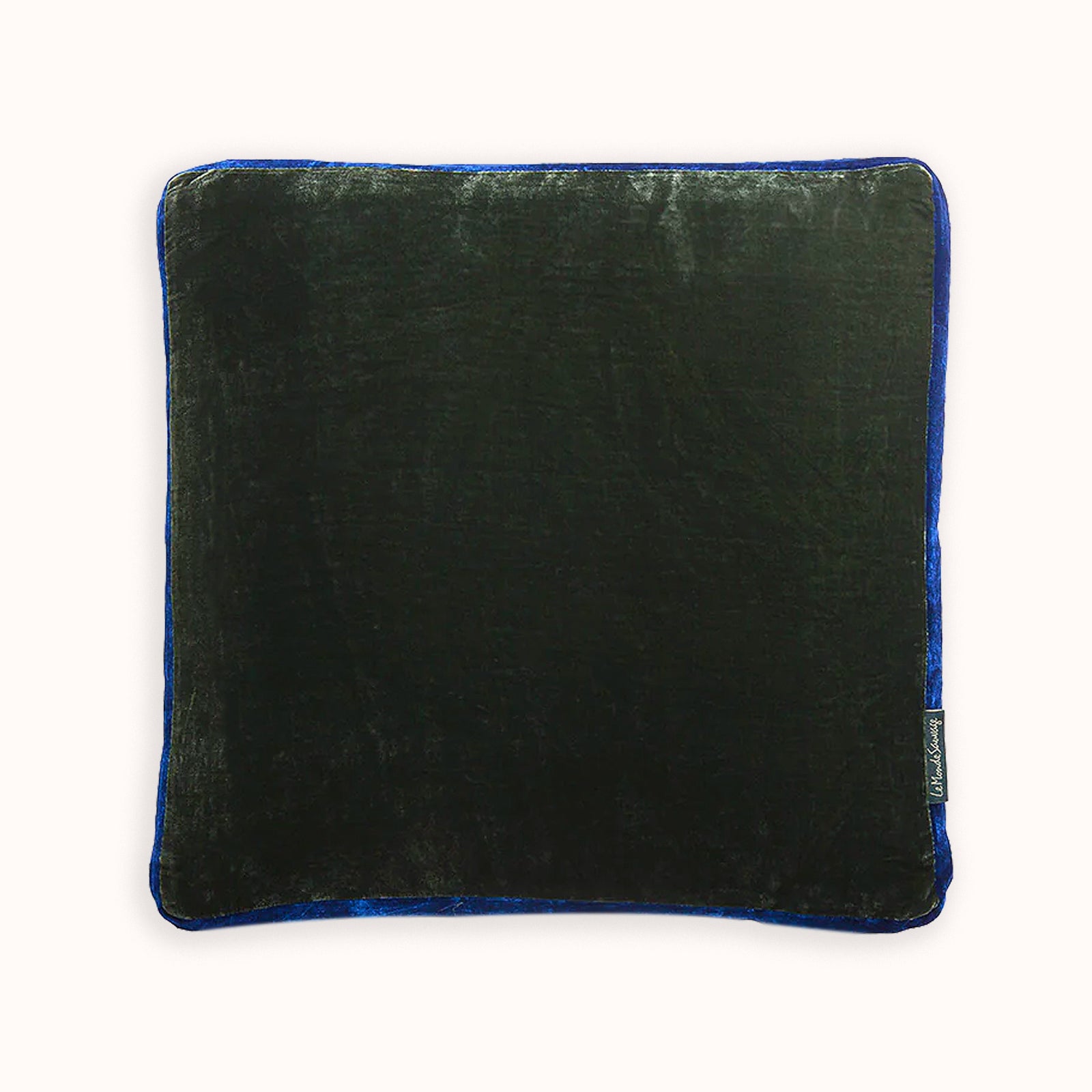Dark green square cushion in silk velvet velour, on a white background. Model James, designed by Monde Sauvage Paris, available at Wildschut Antiques.
