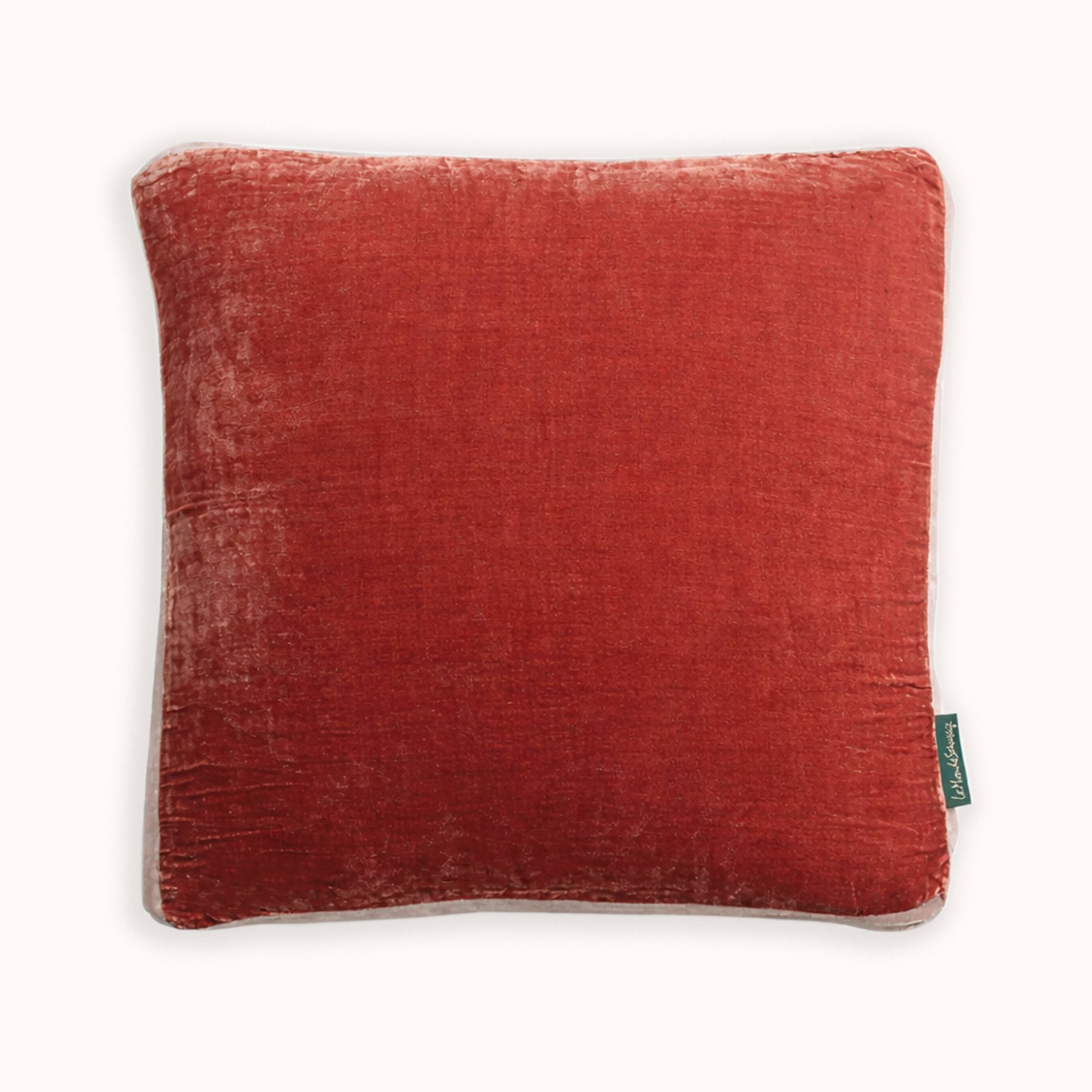 Brique red square cushion in silk velvet velour, on a white background. Model James, designed by Monde Sauvage Paris, available at Wildschut Antiques.