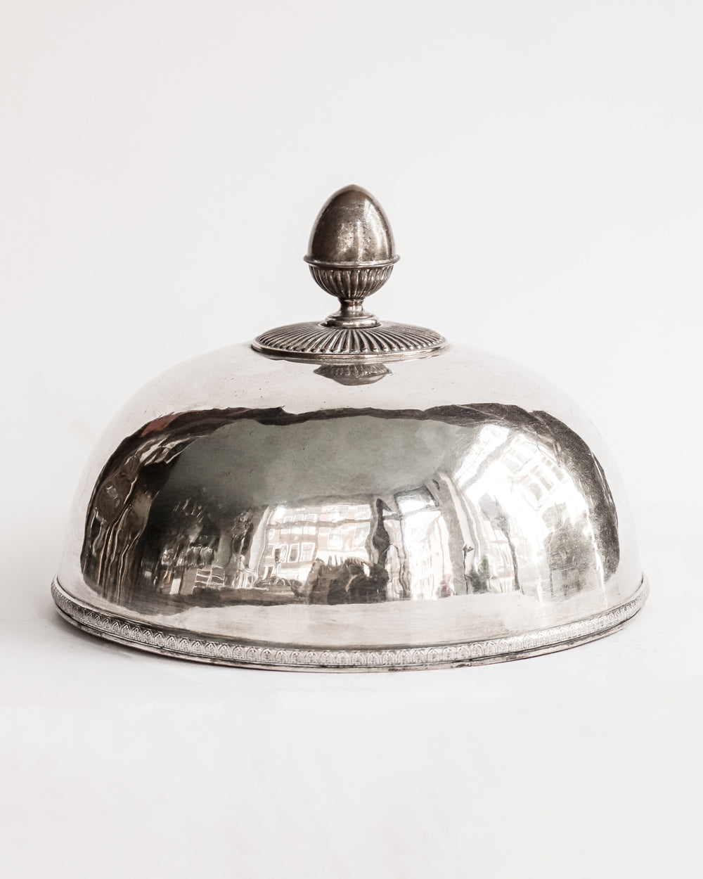Decorative antique silver-plated food dome, offered by Wildschut Antiques.