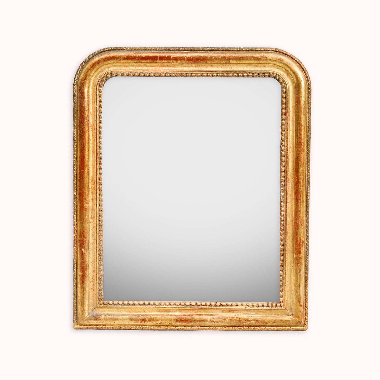 Lovely Gold-framed antique French Louis Philippe mirror on a white background available via Wildschut Antiques