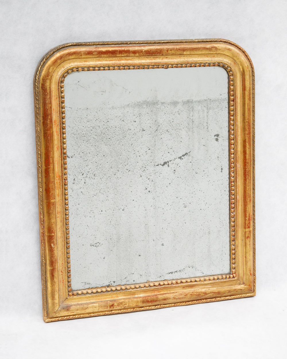 Lovely gold-framed antique French Louis Philippe mirror with foxed glass, available via Wildschut Antiques