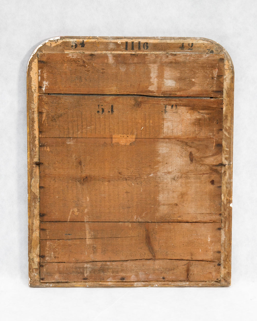 Wooden backside with some visible wear belonging to a small Louis Philippe antique mirror