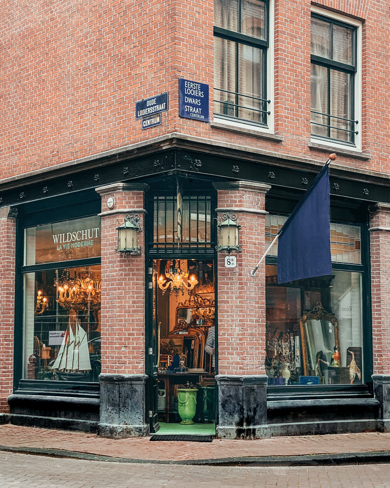 Facade of Wildschut Antiques & Decor, located in the Jordaan district of Amsterdam