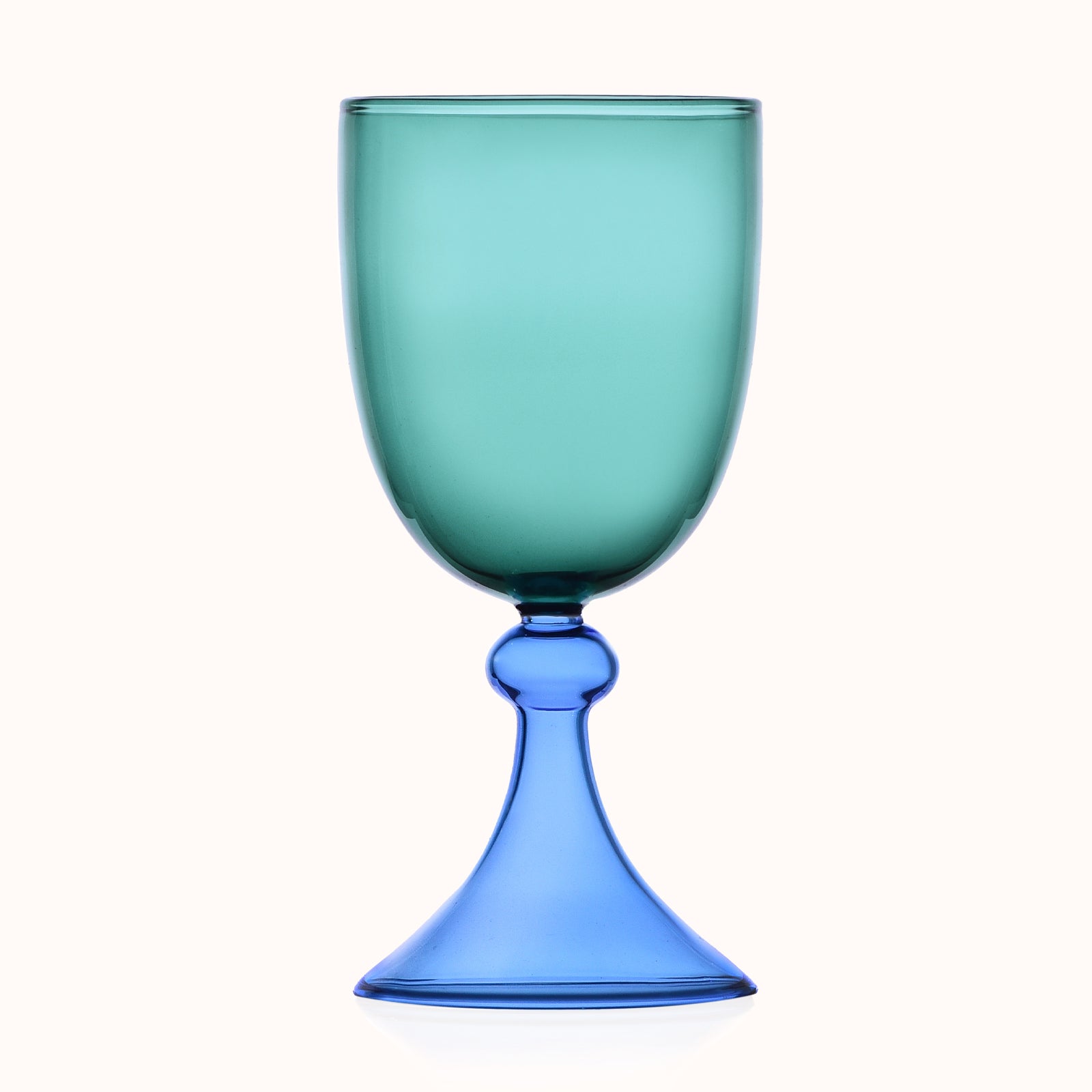 Teal wine glass with a blue stem on a white background
