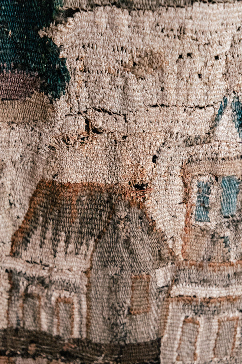 Close-up of a textured fabric with architectural details