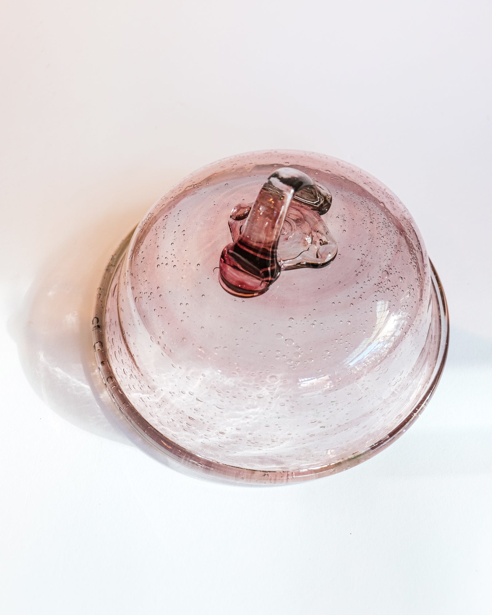 Top view of a taupe-colored bubble glass bell dome by Biot, circa 1970s, available at Wildschut Antiques.
