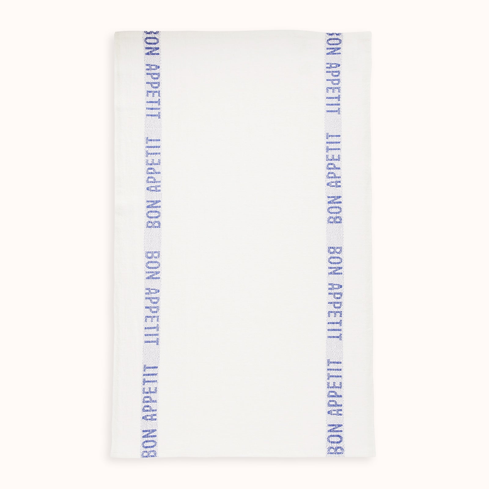 White linen dish towel with 'BON APPÉTIT' embroidered in blue along the edges, by Charvet Editions, available at Wildschut Antiques