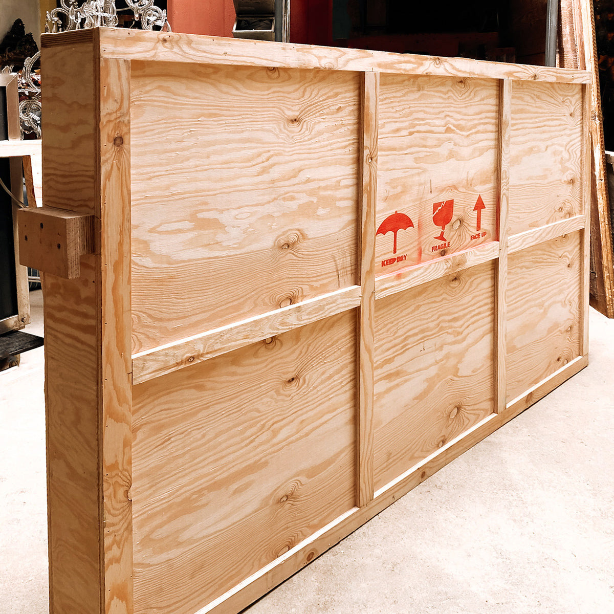 Wooden transport crate in the warehouse of Wildschut Antiques