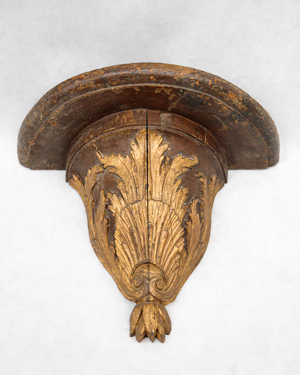 Decorative antique wooden bracket with intricate carvings on a white background available at Wildschut Antiques