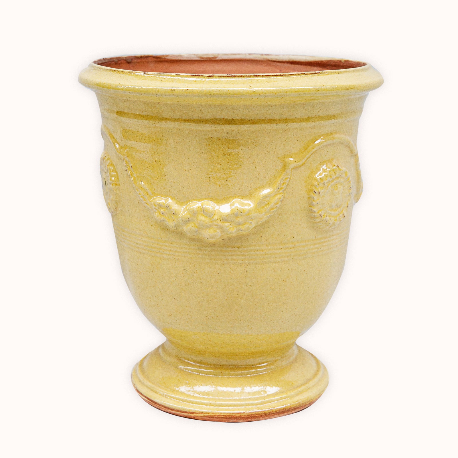 Yellow ceramic French Anduze pot with decorative elements available at Wildschut Antiques