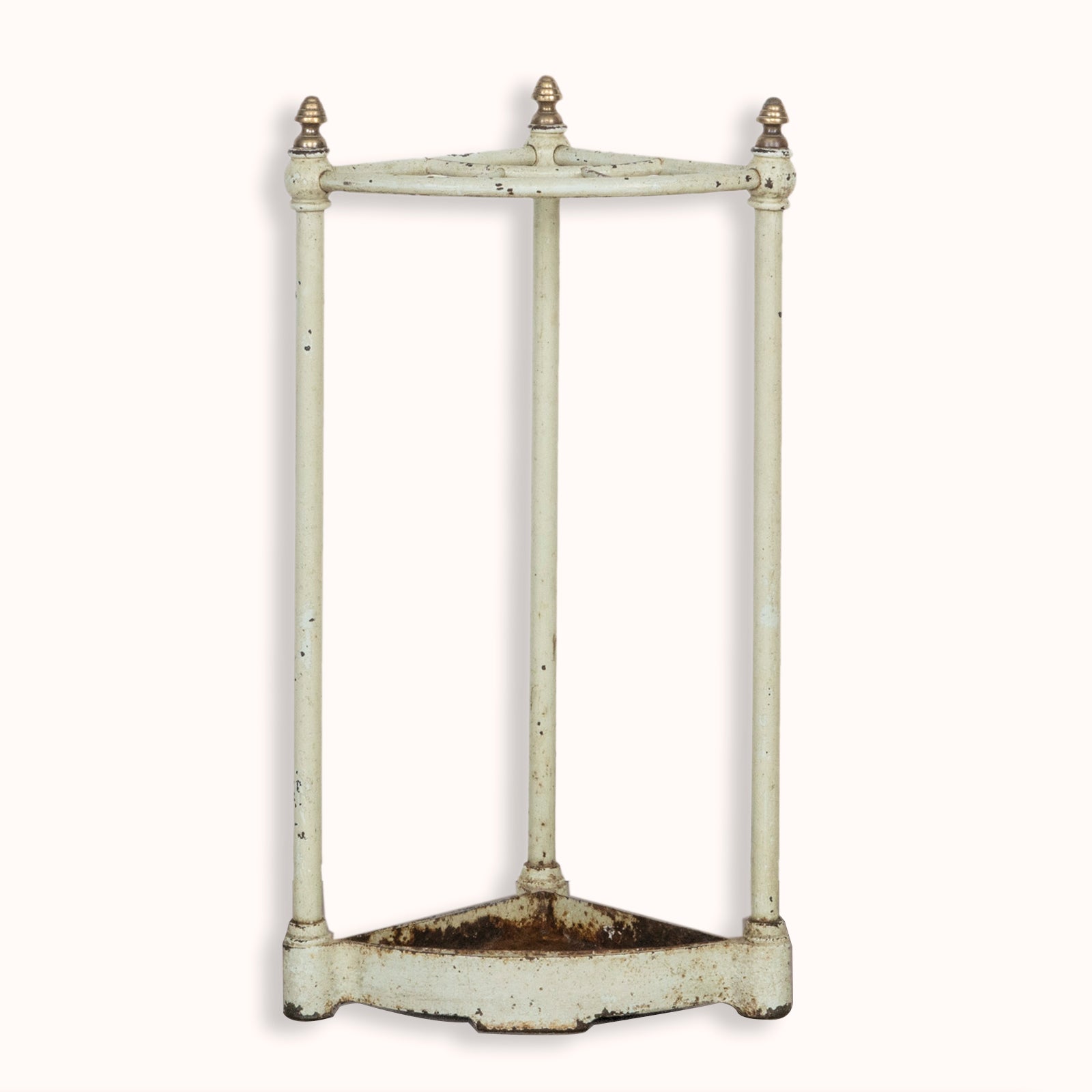 An antique mint green brass and painted iron corner umbrella rack with four compartments, featuring a aged patina, available at Wildschut Antiques