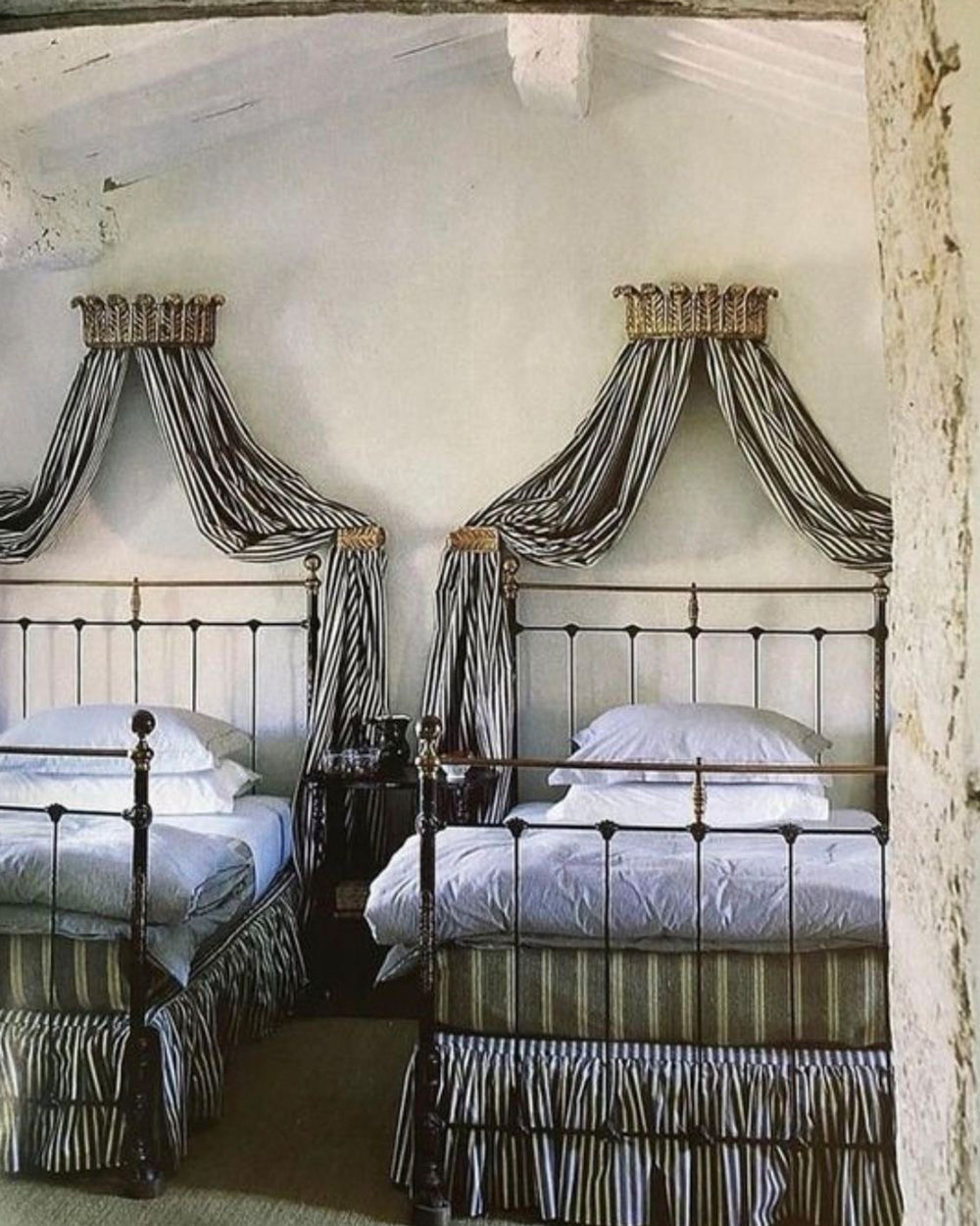 Matching Pair of Antique Cast Iron Antique Single Beds in Black and Gold