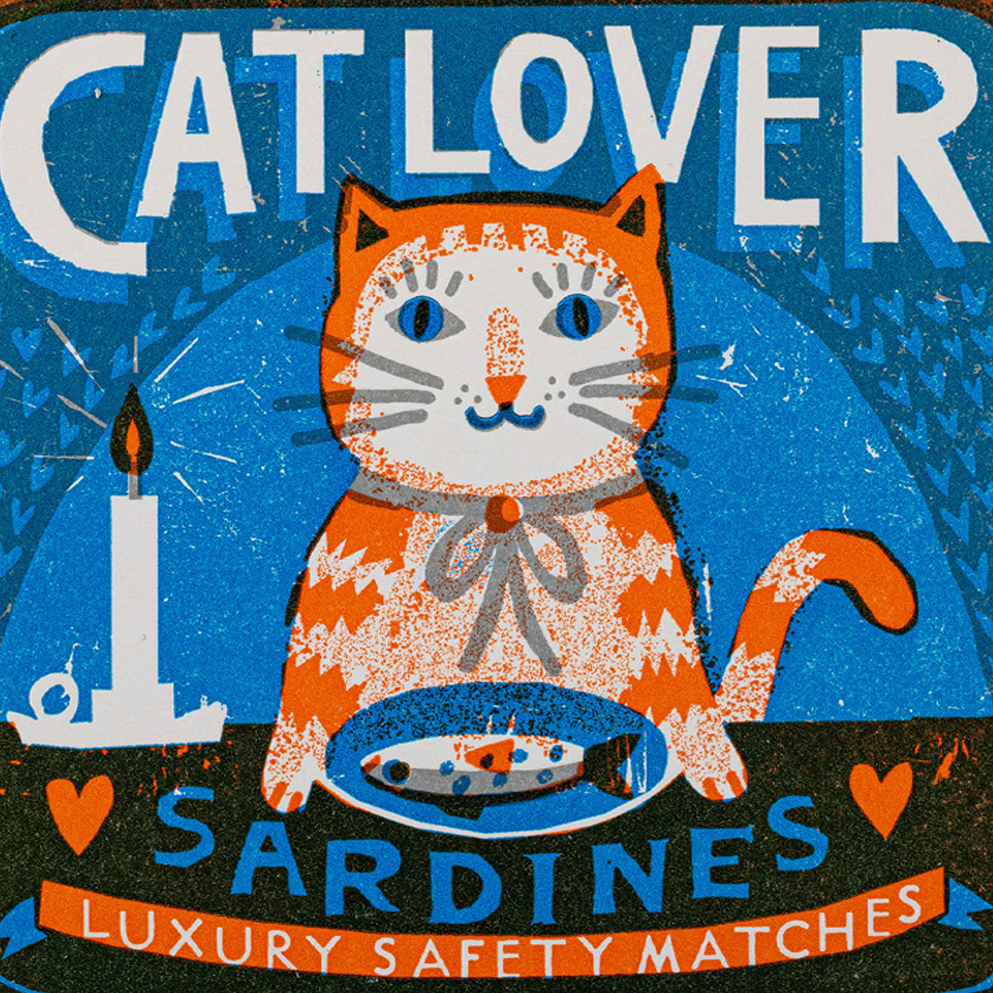 Matchbox label with a cat holding sardines and text 'Cat Lover Sardines Luxury Safety Matches' on a blue background. Design by Archivist Gallery, available at Wildschut Antiques.