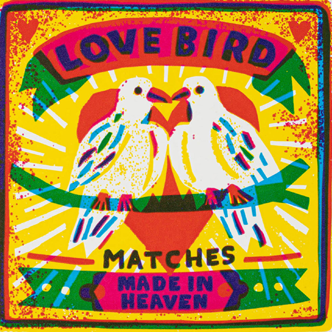Colorful matchbox label with two lovebirds and text 'Love Bird Matches Made in Heaven' on a yellow background.