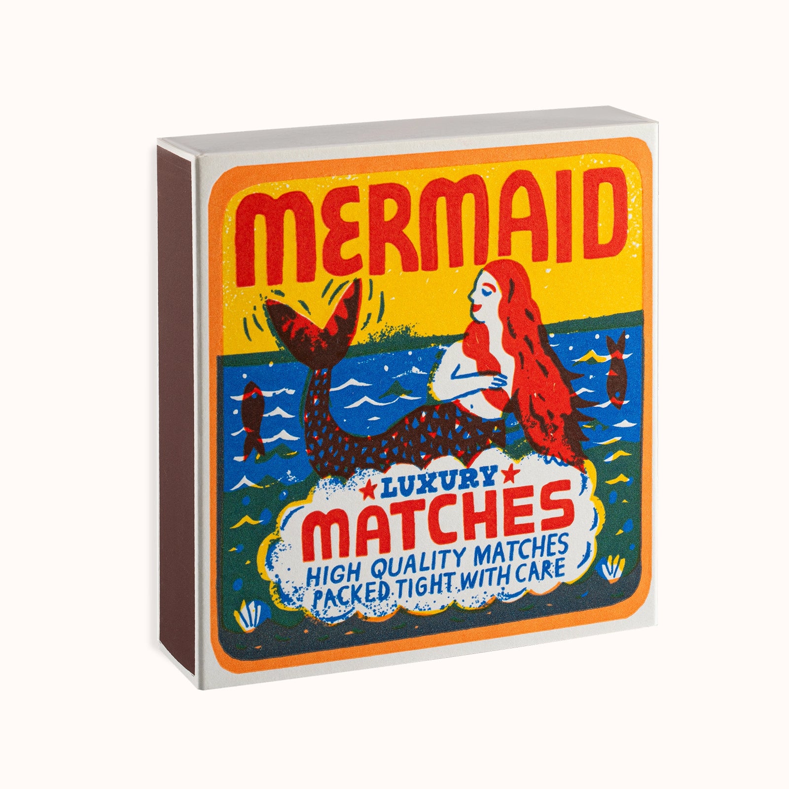 Mermaid matches packaging with colorful design on a white background. By Archivist Gallery, available at Wildschut Antiques.
