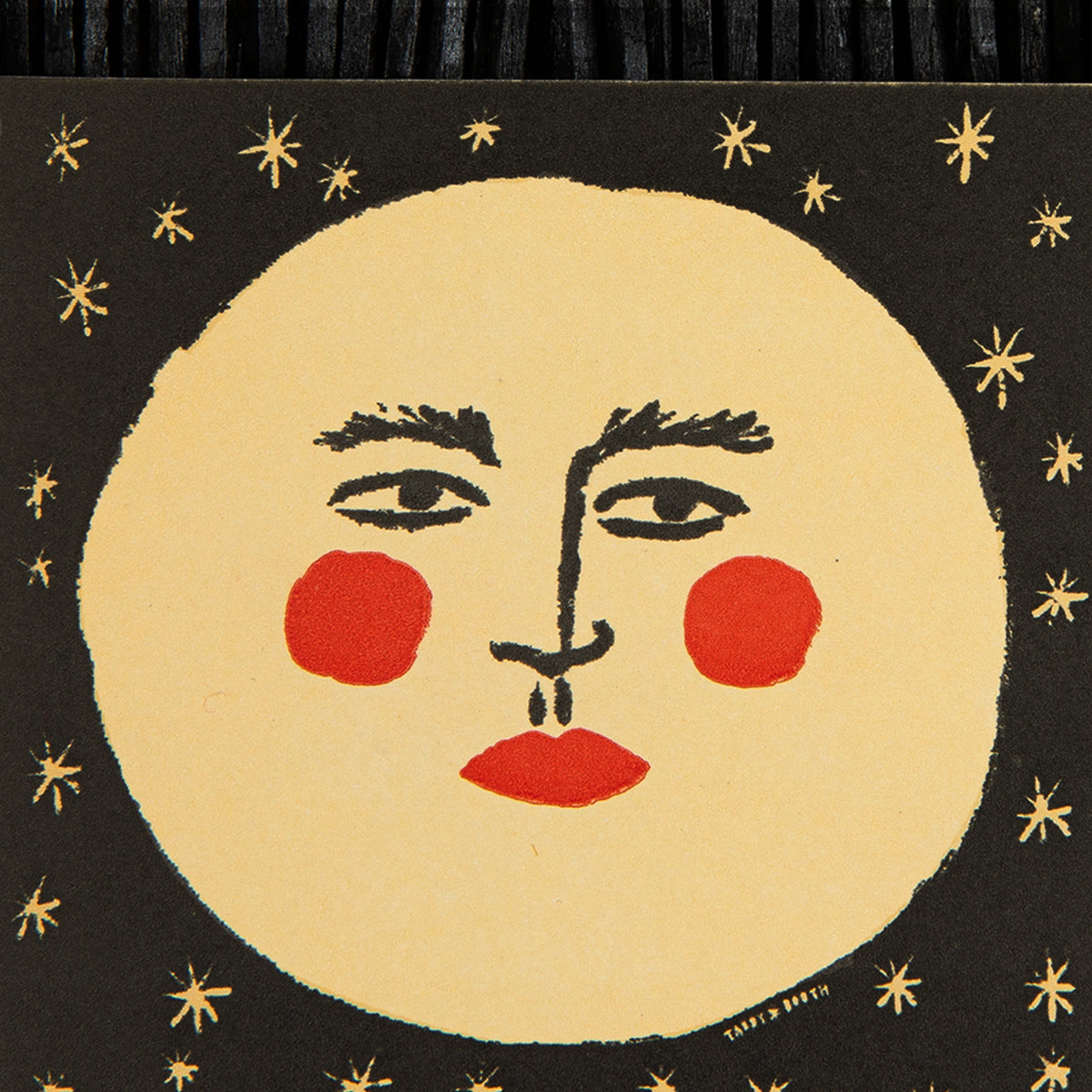 Artistic depiction of a moon face design on a black background with gold stars.